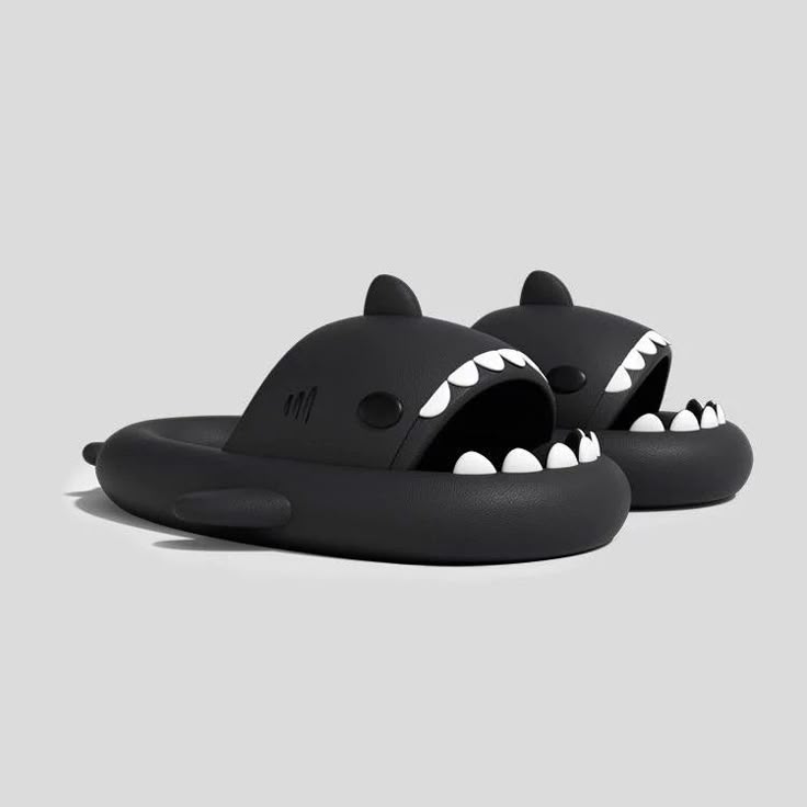 Black shark-themed slides on a light gray background
